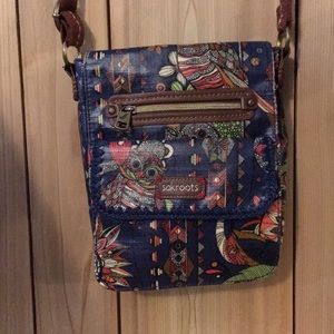 Very cute Sakroots cross body purse!
